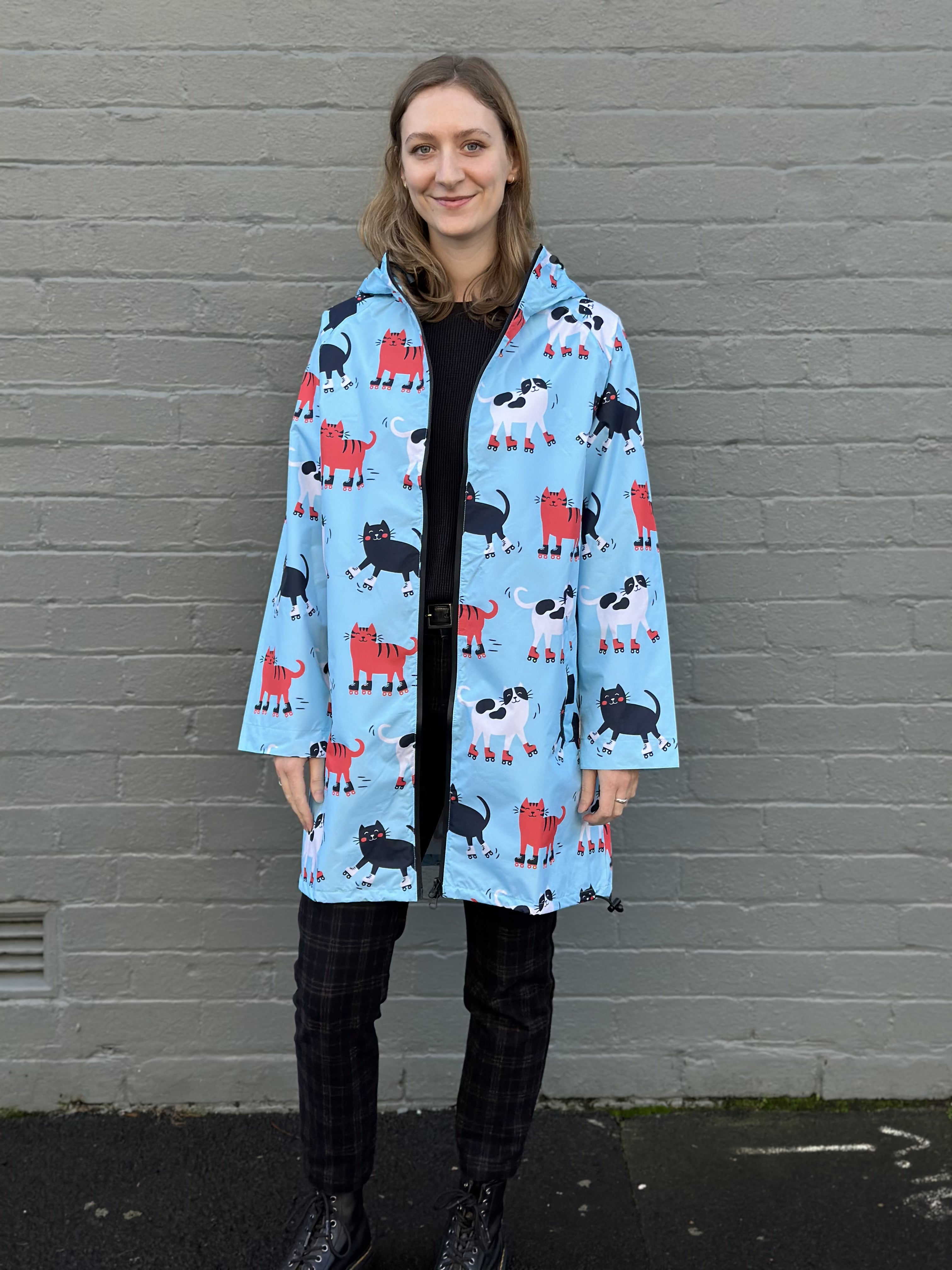 Raincoat: Skating Cats