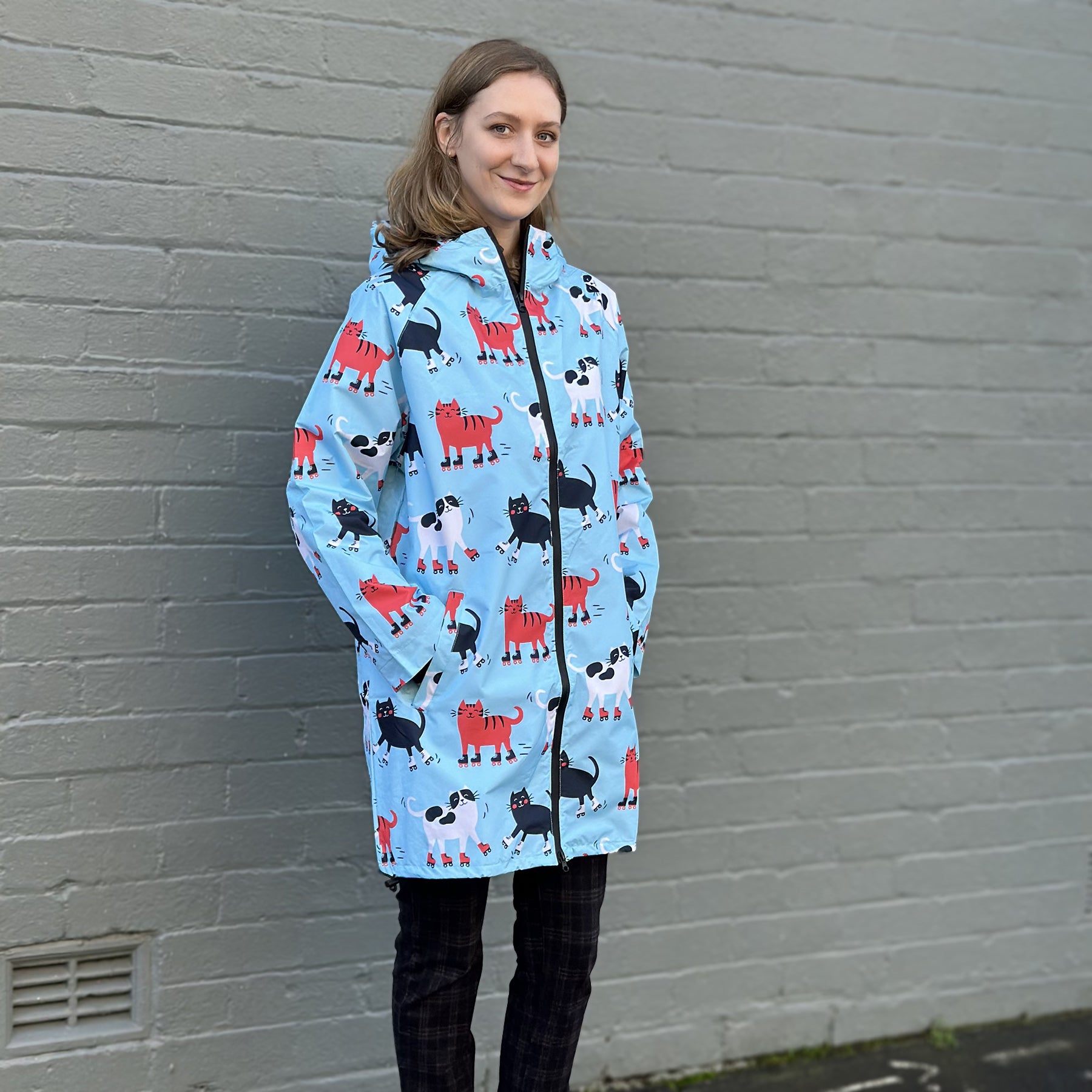 Raincoat: Skating Cats