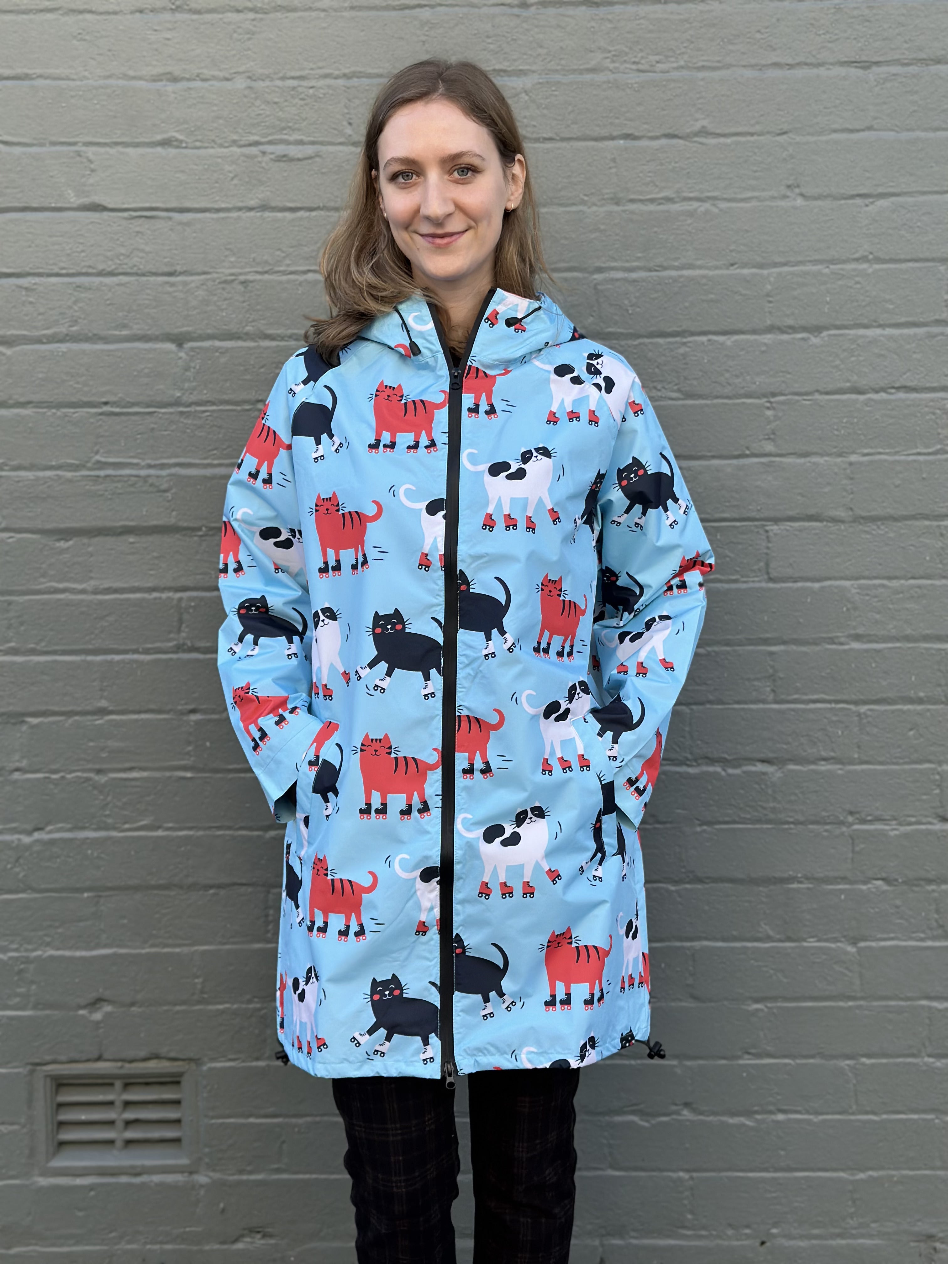 Raincoat: Skating Cats